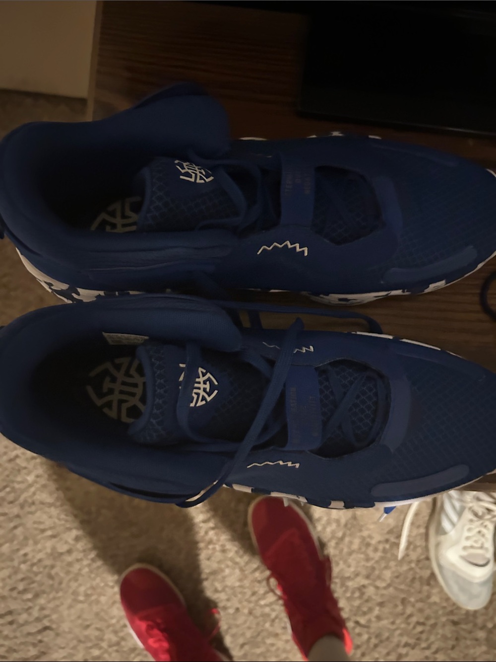 Deep Blue Athletic Sneakers with White Sole Accents Donovan Mitchell’s
